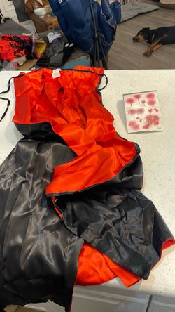 Adult vampire cape and tattoo scars