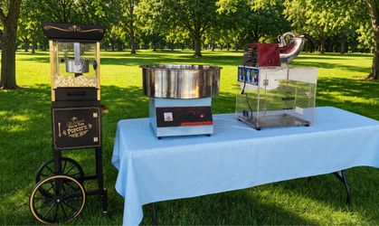 Popcorn machine, snow cone machine, cotton candy machine $55 each with supplies ((50-55) servings