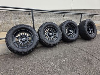18" KMC Forged w/ 33" BfGoodrich KO2 tires 33x12.50R18 18x9