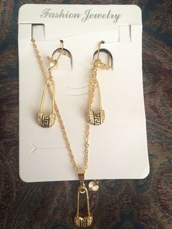 Versace earrings and necklace design