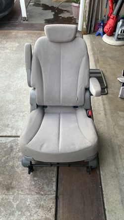 Gray Cloth Car Seat with Armrests and Headrest