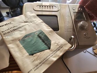 Bread maker with slicer