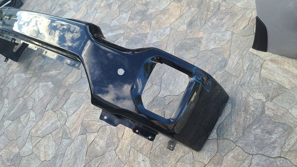 2020 - 2022 GMC SIERRA/DENALI HD2500- HD3500HD FRONT BUMPER COVER OEM W/FOG LIGHT HOLES SENSORS USED OEM . Y11