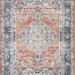 Orange and gray area rug