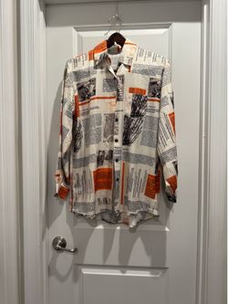 Vintage Newspaper Print Button-Up Shirt with Orange Accents size medium