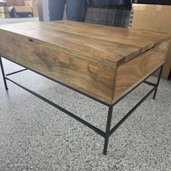 Coffee table with lift top