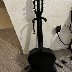 Black Guitar And Stand 