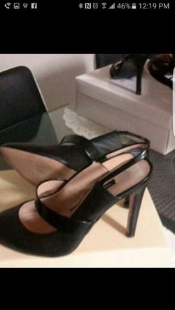 Black heels new in box