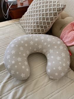 Grey Baby Boppy pillow with star cover