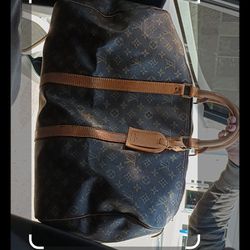 Louis Vuitton Authentic Duffle Bag