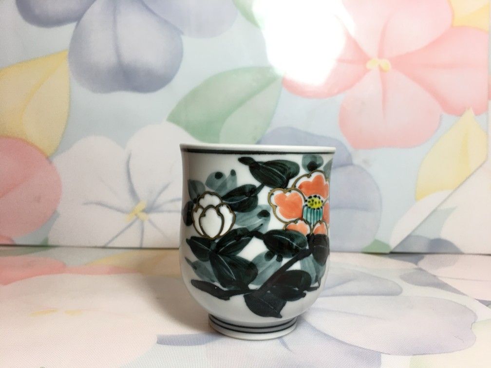 Tiny flower Asian tea cup