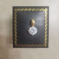 14 K Gold Pendant With CZ.  Weight Is 2.7 Grams 