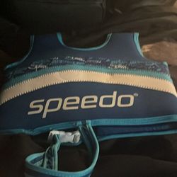 adult life jacket to sqaure theow life devices and two small children lige jackets