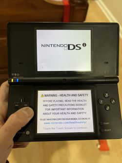 Black Nintendo DSi - comes with charger