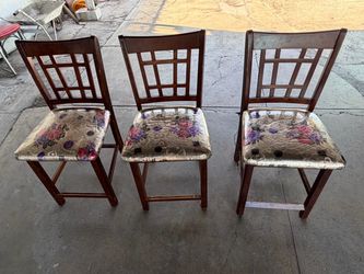 3 wooden chairs