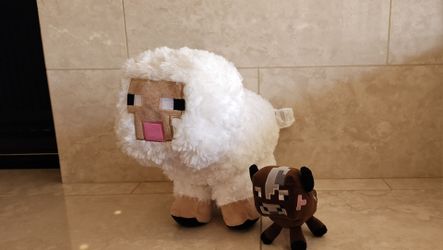 official Minecraft plush toys (a large White Sheep plush and a small Minecraft Cow / Baby Cow plush