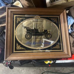 Model T. Mirror, antique vintage bar, shop, car old frame, wood.