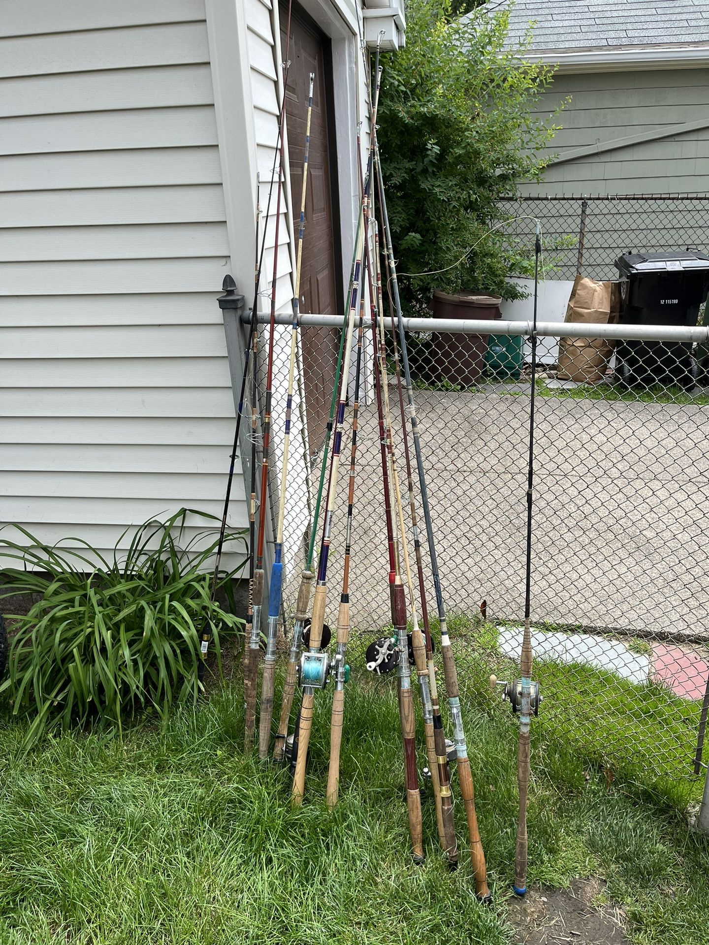 14 fishing rods and reels