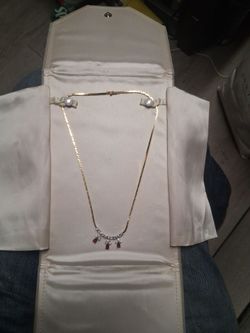 14 k yellow gold  1.5 CT  ruby  chain