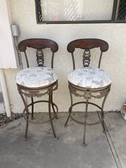 2 Rod Iron Swivel Chairs
