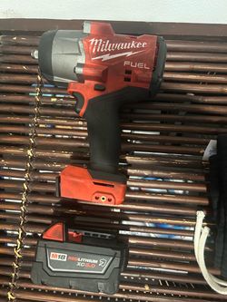 .  Milwaukee M18 FUEL 1/2” Impact Wrench Kit w/ XC5.0, Charger & Hard Case