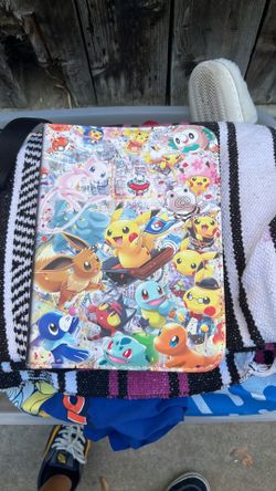 Pokémon cards in binder