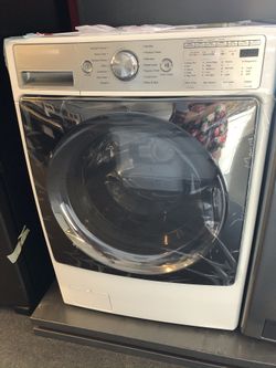 New scratch and dent kenmore front load washer. 1 year warranty