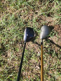 King Cobra and Taylormade golf clubs in good condition