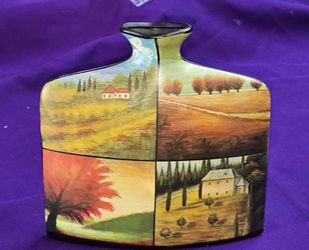 Decorative Flat  Ceramic Vase featuring a four-panel Tuscan landscape design. The artwork depicts various scenes of the Italian countryside C5T110