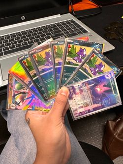 1 Crobat IR, 6 Toxel Holo Promo, 1 Mega Ex Gallade, 64 bulk cards, 5 Chikorita coins
