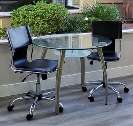 Glass table and 3 chairs