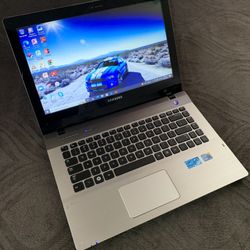 14"inch Intel Core i5 Samsung Laptop, 640GB HDD, 6GB RAM, Inbuilt Bluetooth, DVD, HDMI And a WebCam. NVIDIA GeForce 310M.