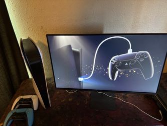 Sony PlayStation 5 Console with Two Controllers