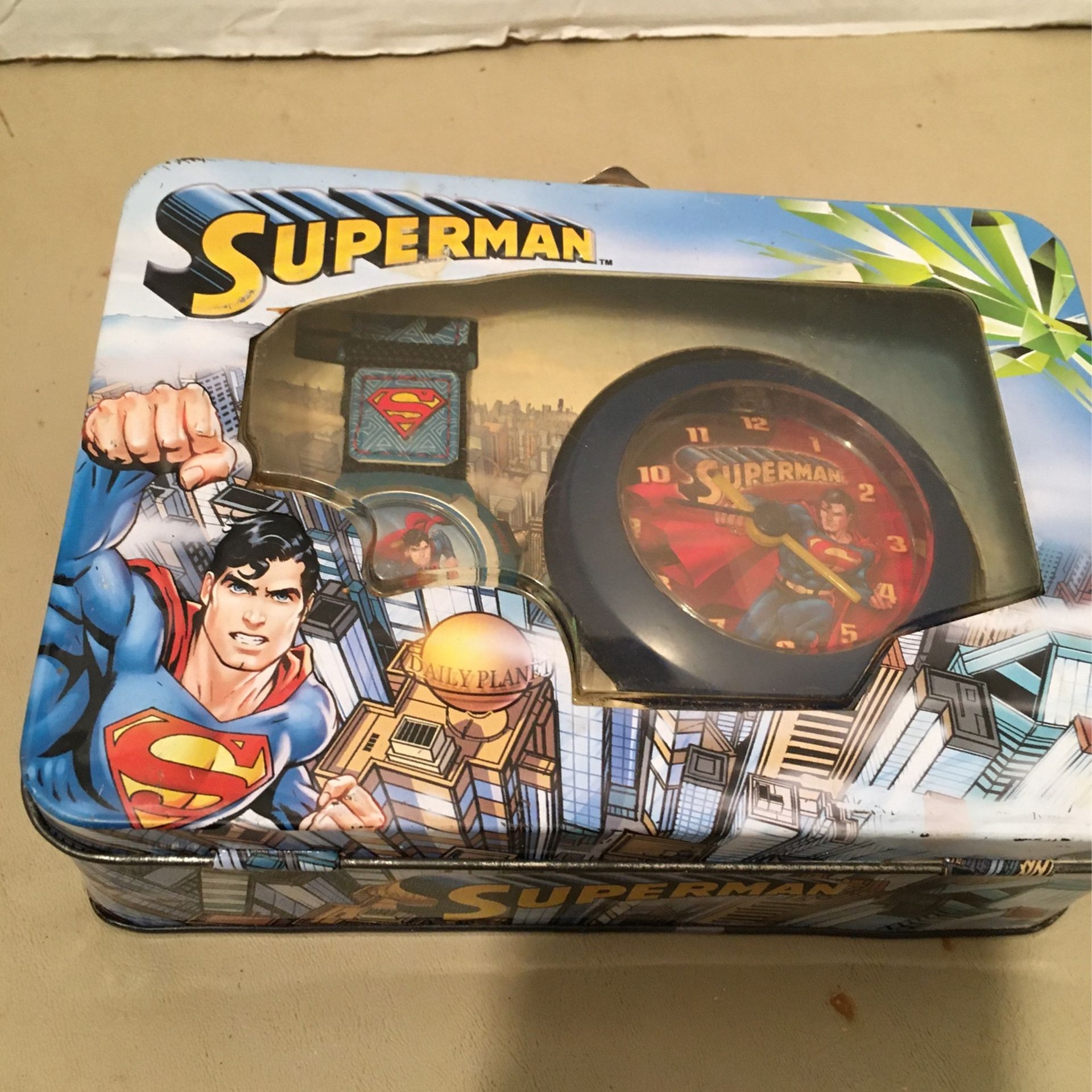 New superman clock and wrist watch in a small lunchpail with clear plastic cover