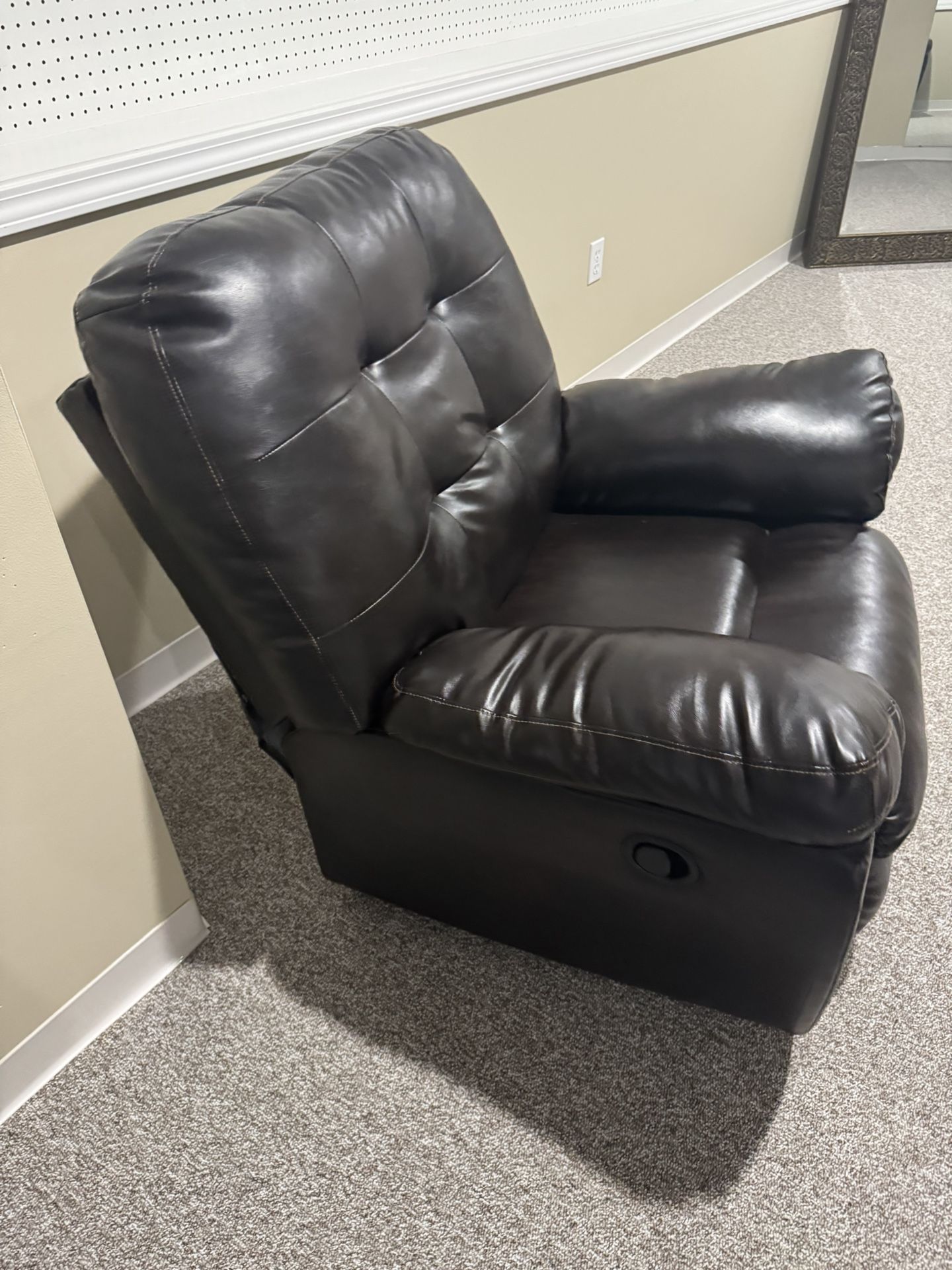 Brown leather recliner, barely used
