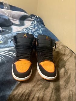 Fat tongue orange and black Jordan 1s