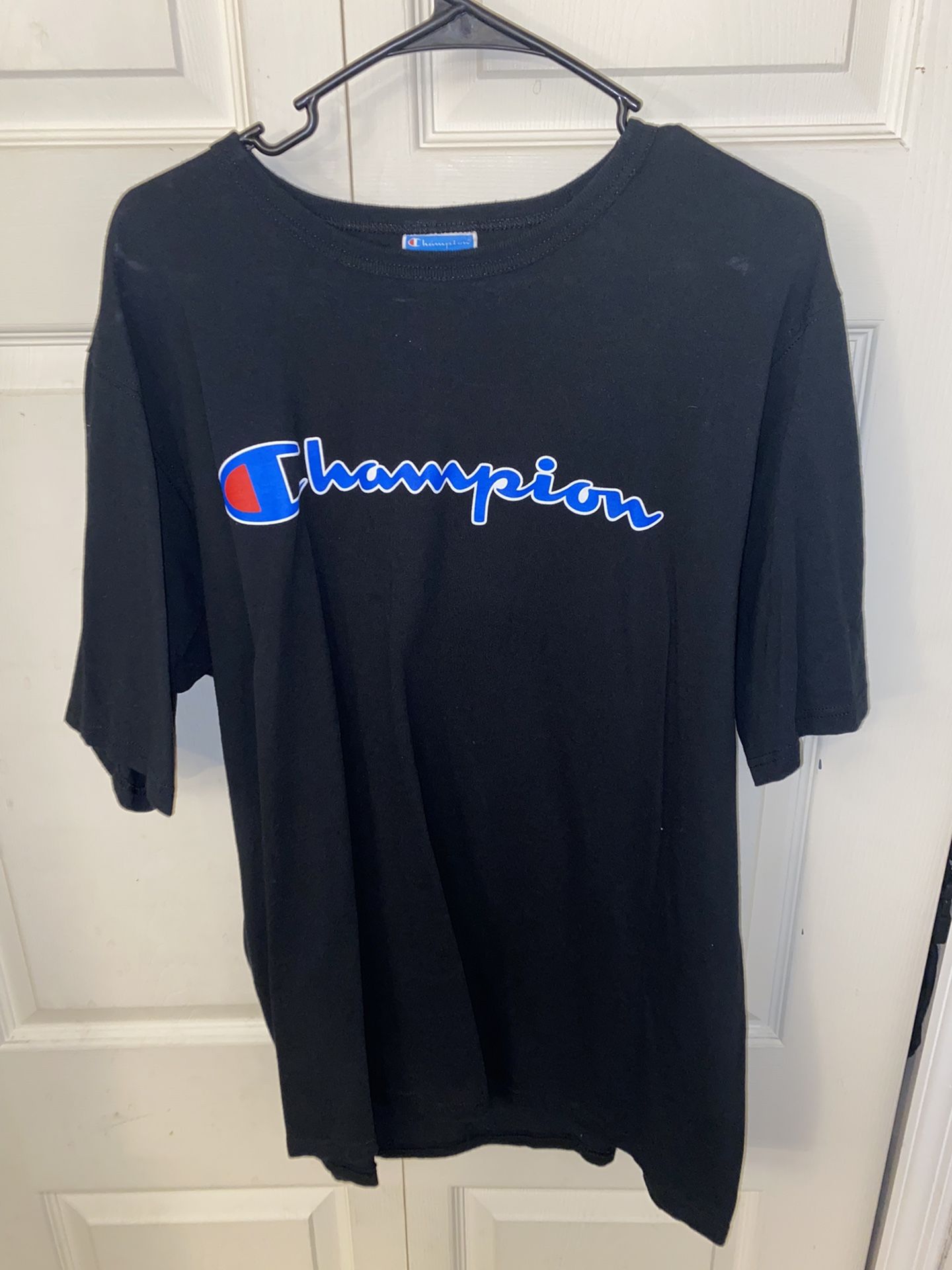 Champion Tee