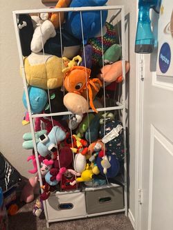 Stuffed animal, cage and organizer