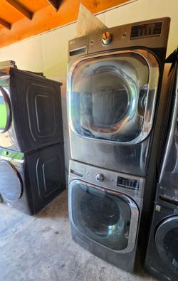 LG GREY GRAPHITE STEAM 5.3 CU FT SMART FRONT LOAD WASHER AND GAS DRYER with blemishes