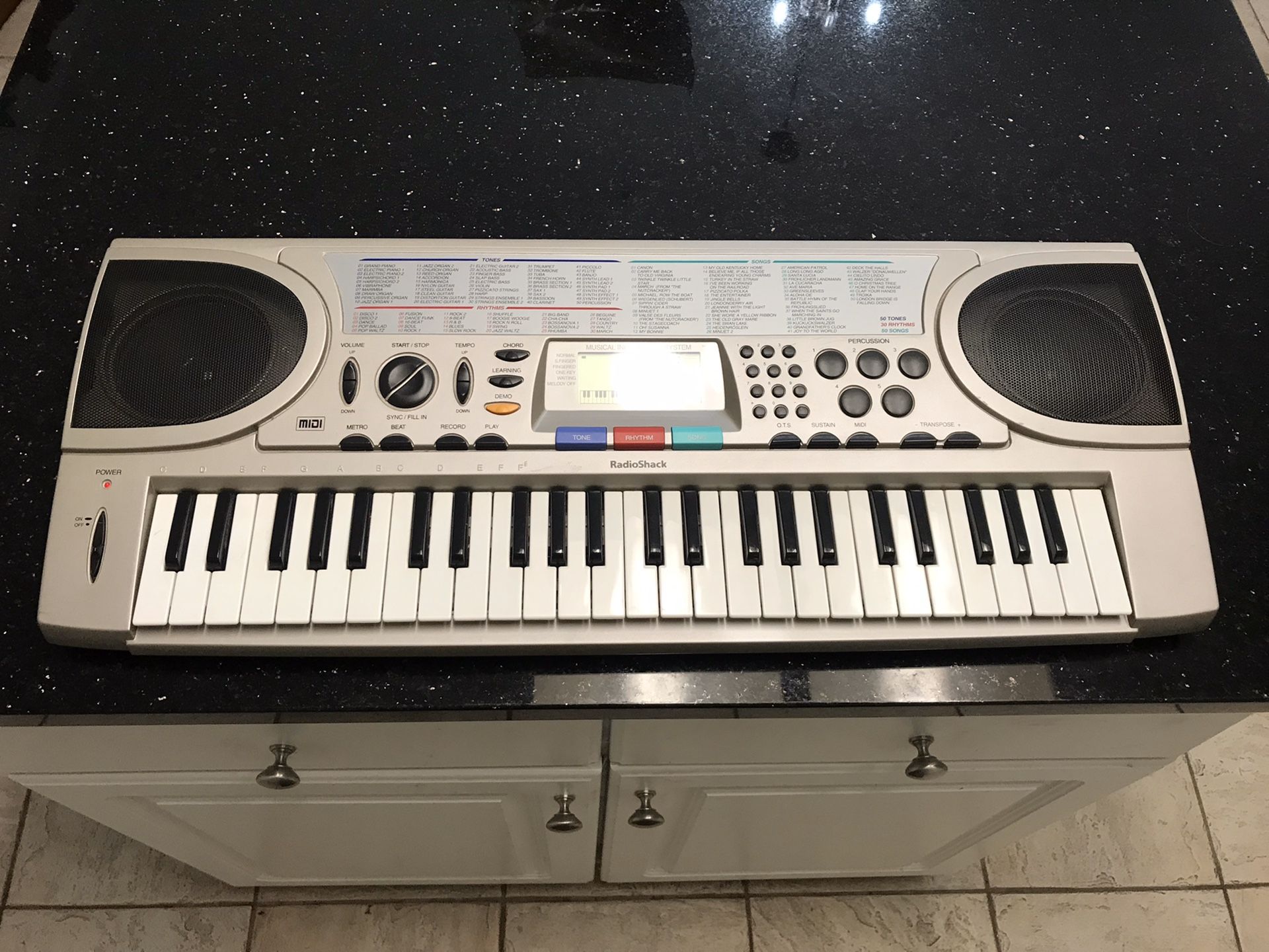 RADIO SHACK MIDI KEYBOARD MD501 WITH 49 MINI KEYS. Excellent working