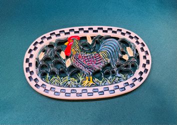 Beautiful hand painted cast iron rooster trivet with checkerboard boarder