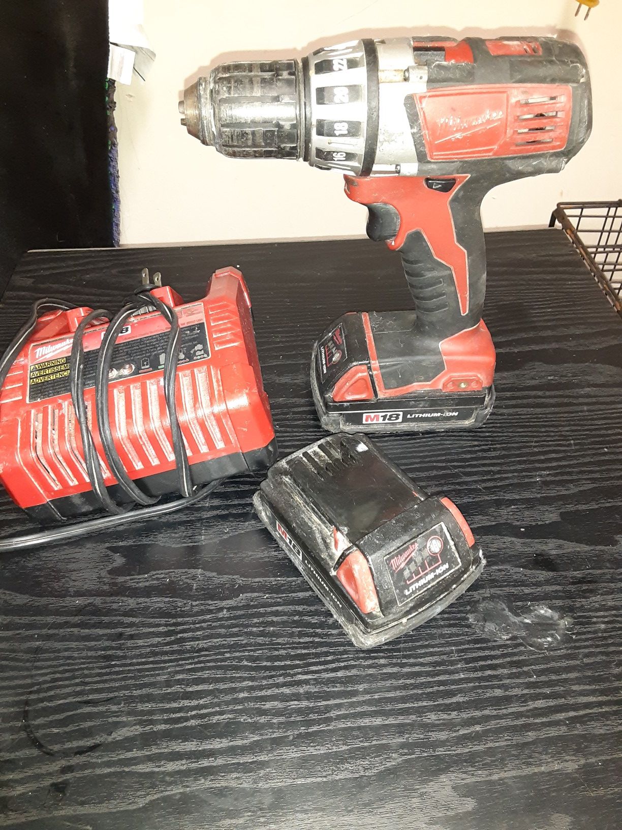 Milwaukie drill with two batteries and charger used but work perfectly