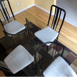 Glass Dining Room Table set with 4 cushioned chairs