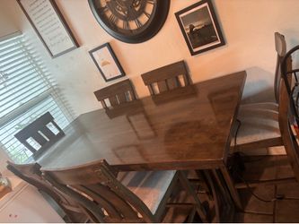 Dinning room table with six chairs