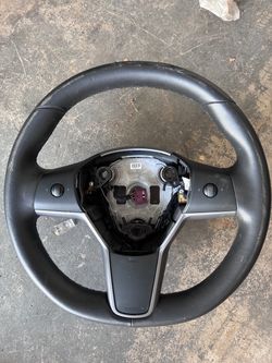Original Tesla model 3 steering wheel some peeling