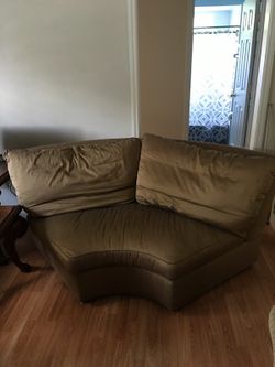 Brown fabric love seat