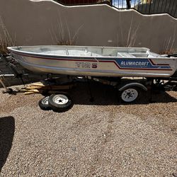 Alumacraft T12S 12 Foot Aluminum Fishing Boat with Trailer and Extras