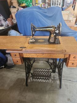 Antique singer Treadle Sewing Machine with Cabinet