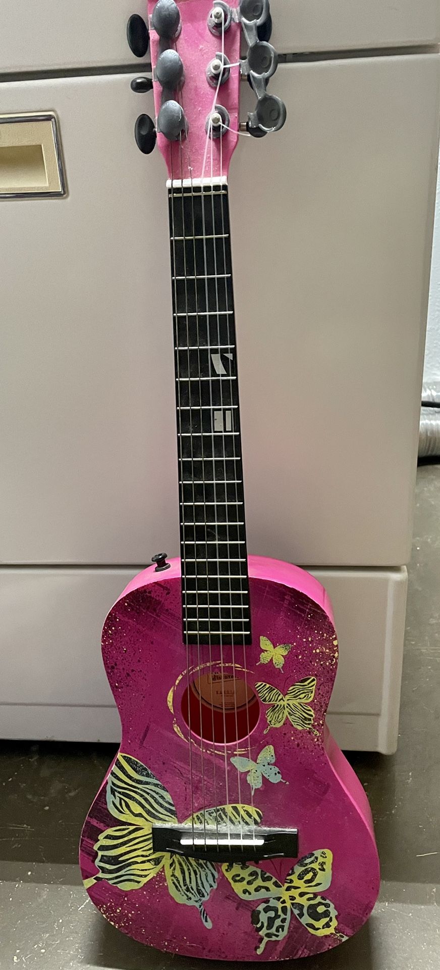 Kids guitar brand new strings tuned five bucks