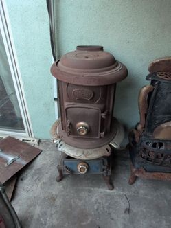 Antique pot belly comfort stove
